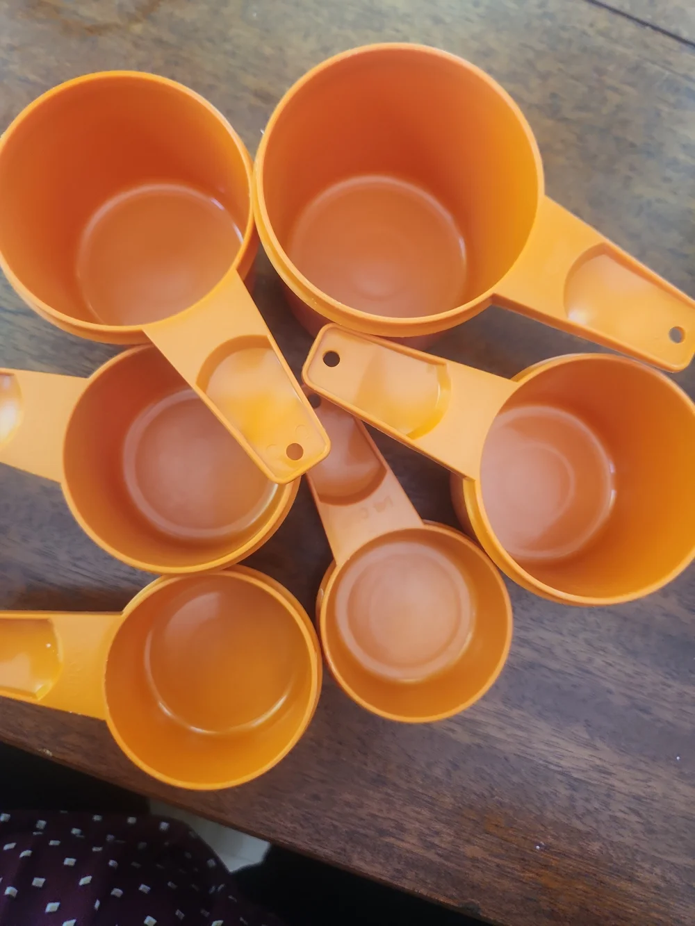 TupperwareOrange Plastic Measuring Cups Plus Other Helpful Kitchen Items
